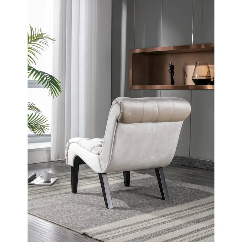 Poltrona d'accento in velluto beige, capitonné, seduta singola, gambe in legno nero