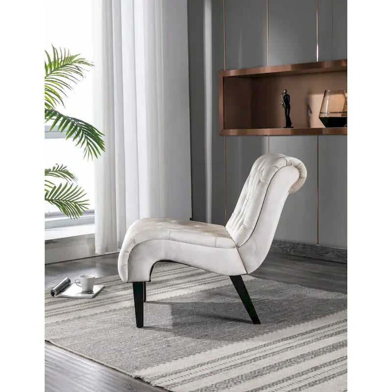 Poltrona d'accento in velluto beige, capitonné, seduta singola, gambe in legno nero